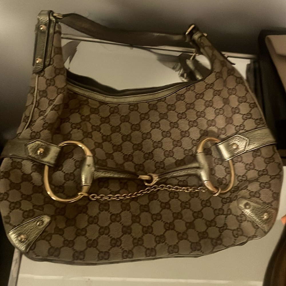 Gucci Authentic  green snake medium hobo with leather trim, gold hardware